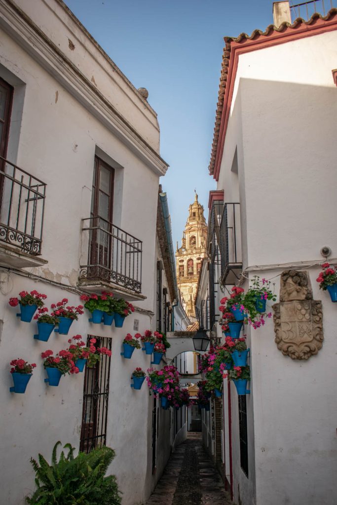 Cordoba Mezquita Bell Tower seen between two streets