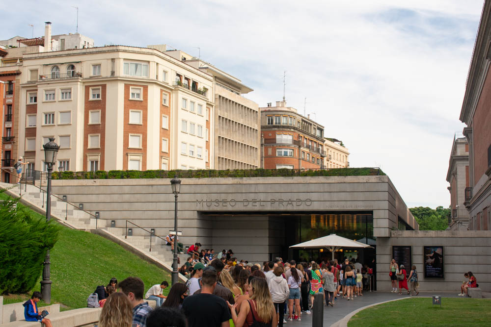 Tourists in line at the entrance to the Prado Museum in Madrid
